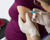 Effets indésirables chez la mère et l’enfant de la dose de rappel du vaccin à ARNm contre le COVID-19 aux États-Unis